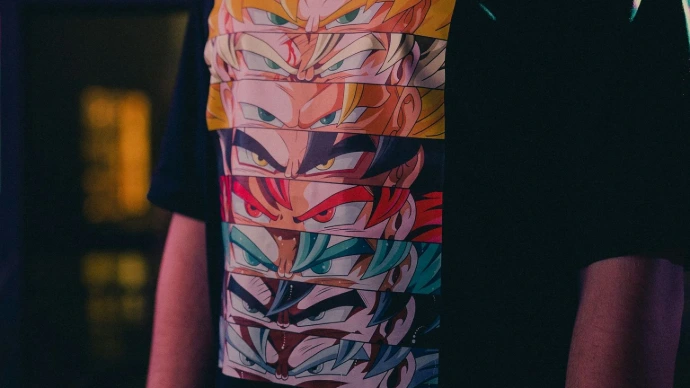a man wearing a t - shirt with a colorful design on it